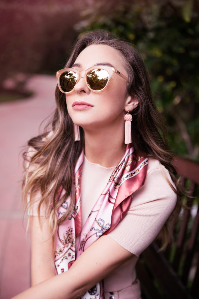 Pink cat eye sunglasses, pink silk scarf at the Beverly Hills Hotel